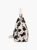 Nikki Slingbag: Cow Print